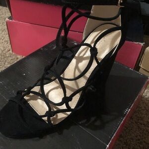 Strappy black heels